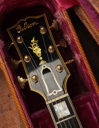 Guitar headstock with 'Gibson' branding