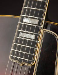 Close up of fingerboard on a vintage archtop guitar 