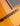 Close up of bridge on a vintage archtop guitar