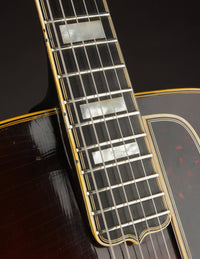 Close up of neck on an archtop guitar 