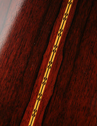 Close-up of backstrip on a Martin acoustic guitar