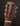 Close-up of a guitar headstock with 'Martin' branding on a dark background