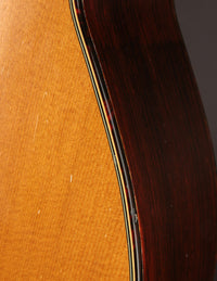 Close up of binding on a Martin acoustic guitar