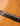 Close-up of a guitar's soundboard with strings and bridge