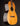 Side view of a Martin acoustic guitar on a black background