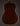 Back view of a 1947 Gibson LG-2 acoustic guitar on a dark background