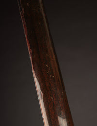 Close up of mahogany neck on a vintage Gibson acoustic guitar
