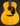 Acoustic guitar with an aged natural finish on a dark background