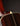 Close-up of a guitar's neck on a dark background