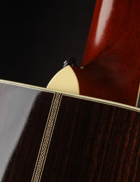 Close up of heel cap on an acoustic guitar