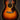 Vintage acoustic guitar with a sunburst finish on a dark background