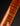 Close-up of a guitar's neck with a dark background