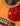 Close-up of an acoustic guitar's soundhole and strings