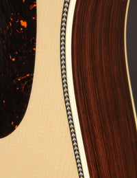 Close-up of an acoustic guitar's binding