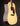 Acoustic guitar with a dark brown finish on a black background