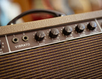 Close up of guitar amplifier controls