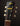 Guitar headstock with 'Atkin' branding on a dark background