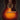 Acoustic guitar with a sunburst finish on a dark background