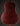Back view of a dark brown acoustic guitar on a black background