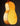 Close-up of a wooden guitar body on a dark background
