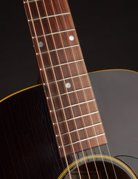 Close-up of a guitar's fretboard