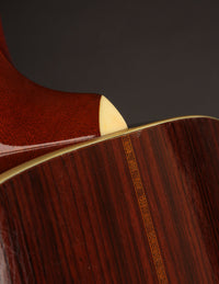 Close up of heel cap and back strip on an acoustic guitar