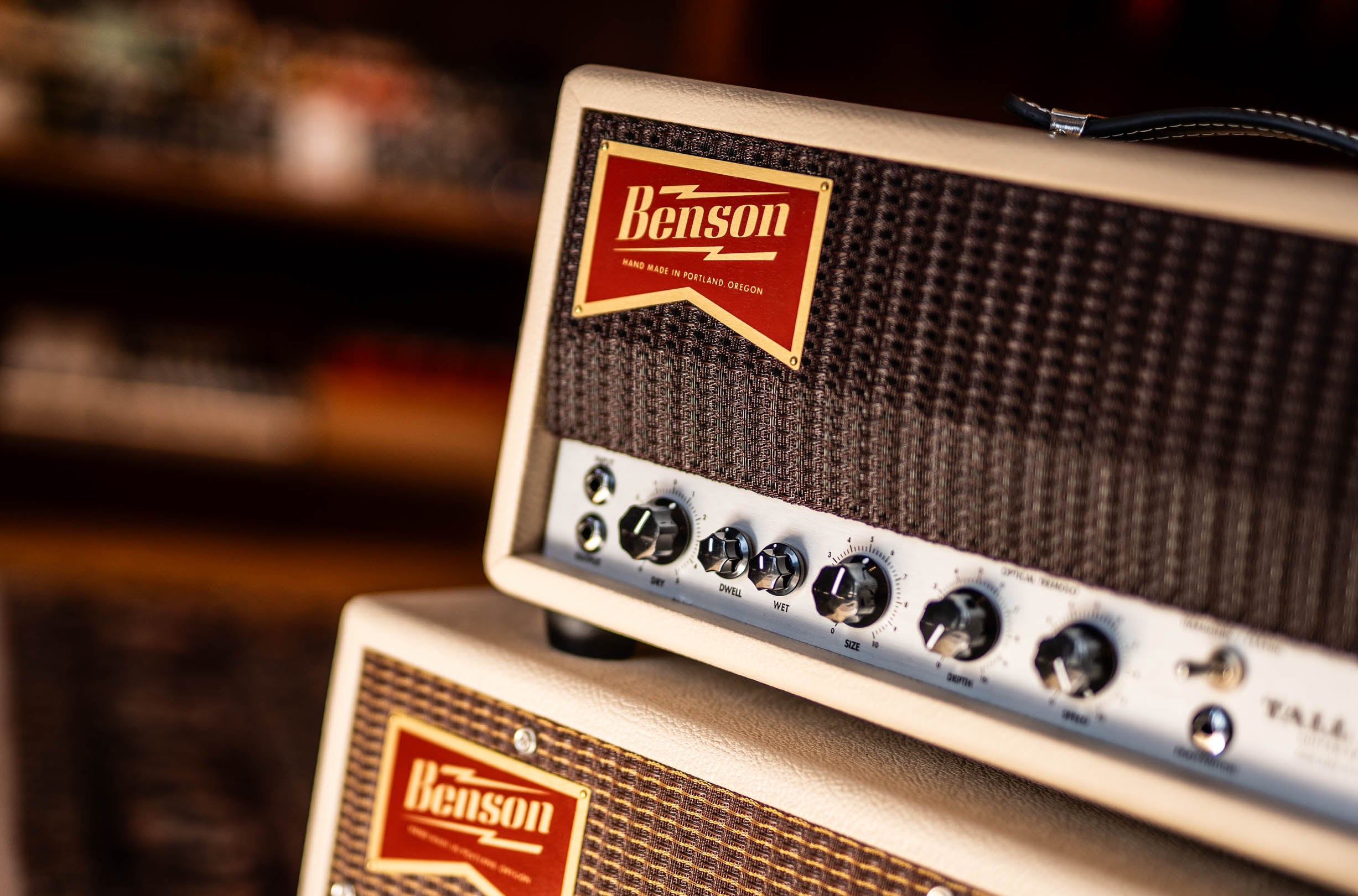 Benson amplifier head with control knobs on a blurred background