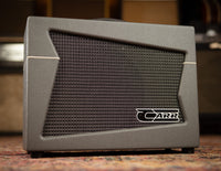 Guitar amplifier with 'Carr' logo on a patterned surface