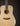 Acoustic guitar with a natural finish on a black background