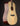 Acoustic guitar with a natural finish on a black background