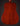 Back view of an acoustic guitar on a dark background