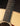 Close-up of a guitar's fretboard with a dark background