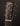 Close-up of a guitar headstock with 'Collings' branding on a dark background