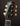 Close-up of a Collings guitar headstock on a dark background
