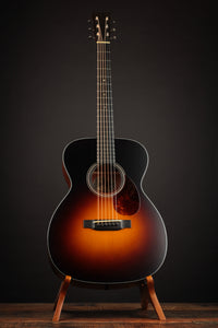 Acoustic Guitar in a Wooden Stand.