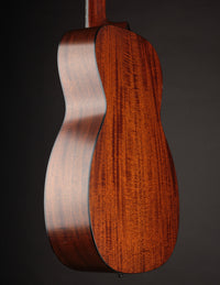 Acoustic Guitar with Figured Mahogany from the Side.