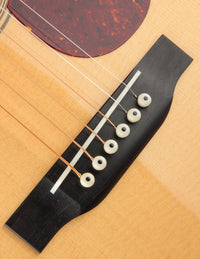 Close-up of a guitar's bridge