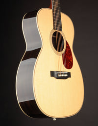 Acoustic guitar with a dark background