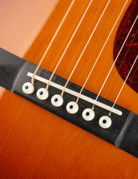 Close-up of a guitar's bridge