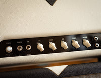 Close up of controls on guitar amplifier