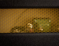 Metal grill on back of guitar amplifier