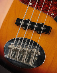 A close up of the Lakland bass bridge and bridge pickup. 