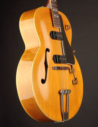 Electric guitar with a glossy finish on a dark background