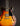 Close-up of a 1961 Sunburst Gibson ES-335TD electric guitar with a dark background