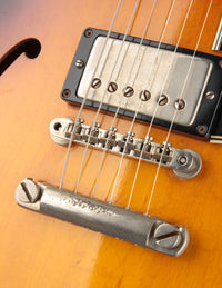 Close-up of bridge and pickup on a 1961 Sunburst Gibson ES-335TD