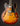 1961 Sunburst Gibson ES-335TD electric guitar against a dark background 