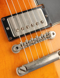 Close-up of bridge and pickup on a 1961 Sunburst Gibson ES-335TD