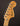 Close-up of a Fender Telecaster Deluxe guitar headstock on a dark background