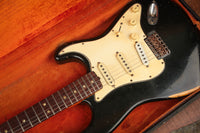 Black 1968 Fender Stratocaster in it's original hardshell case with orange interior