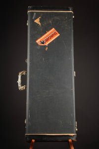Vintage Fender guitar case on a black background